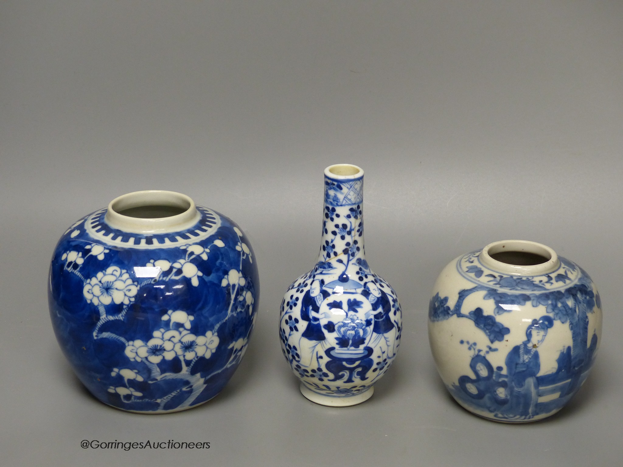 A Chinese blue and white 'ladies' jar, a 'boys' vase and a prunus jar, late 19th / early 20th century, tallest 15cm